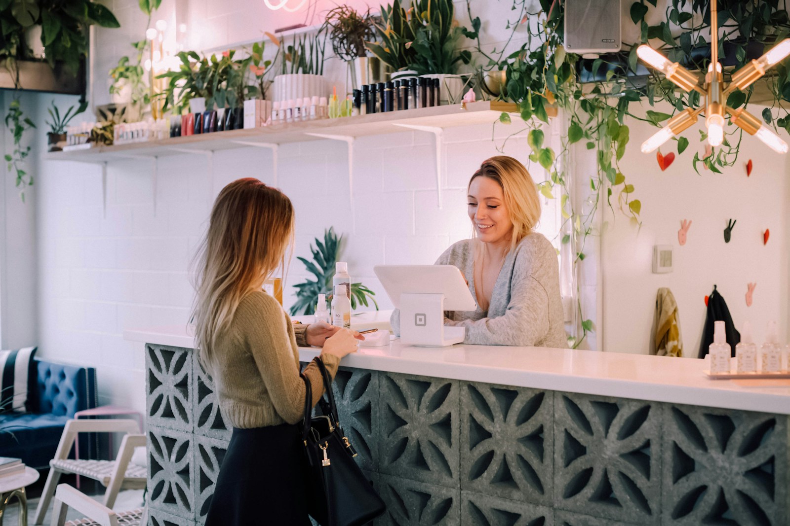 woman facing on white counter, business